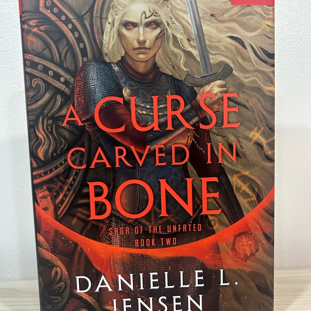 A Curse Carved in Bone by Danielle L. Jensen (Book #2)